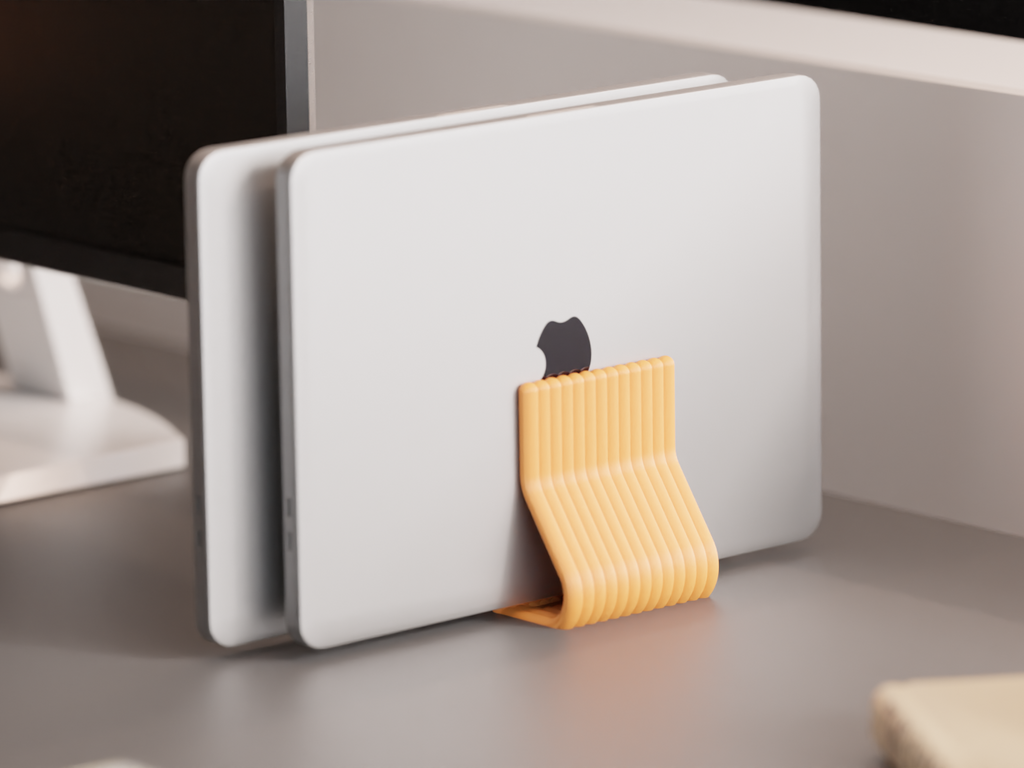 Dual Vertical Laptop Stand. Closed macbook Stand — Originaldesign im Einsatz, Abstractia Design. Weitere Beispielfarben/Größen; bestellbare Auswahl und Lieferumfang laut Produktseite.